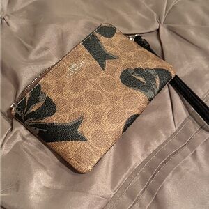 Coach Floral Tan and Black Wristlet excellent condition
